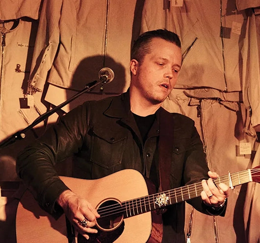 Jason Isbell Performing wearing a Savas leather jacket.