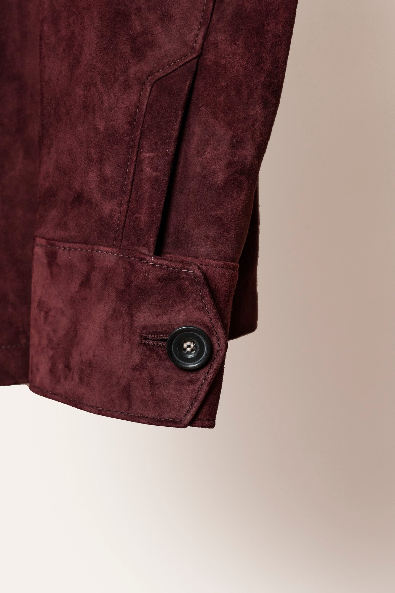 Luxury suede overshirt for men in rich Eggplant — handcrafted in Italy from .6mm full-grain calf suede, finished with buffalo horn buttons.
