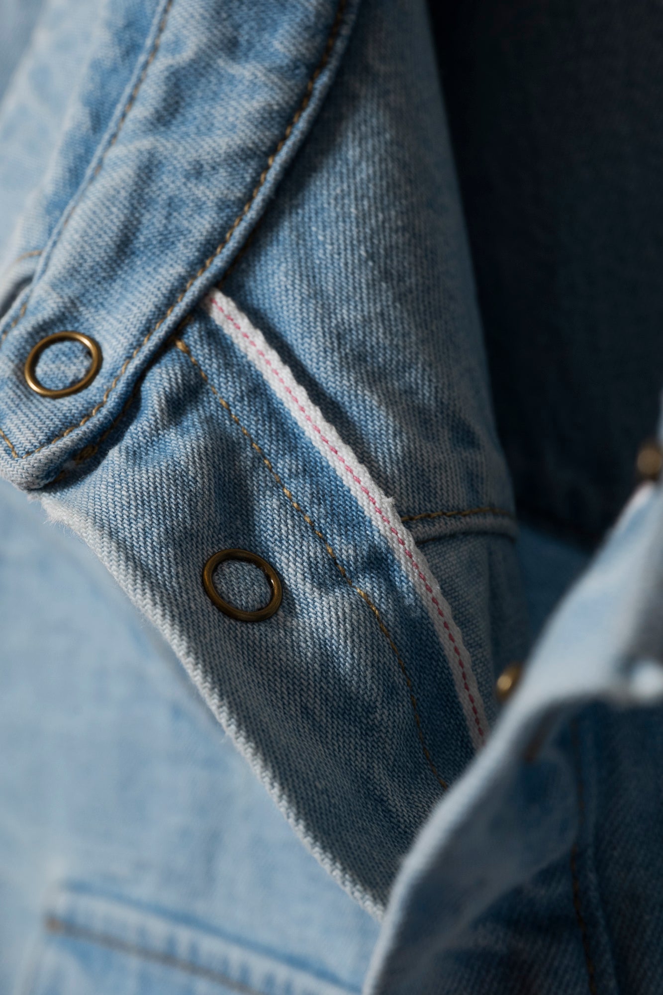 Men’s denim shirt in Japanese selvedge fabric, midweight with structured yet relaxed drape.