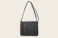 leather crossbody bag in black for men and women with western wear from atelier savas in nashville tn