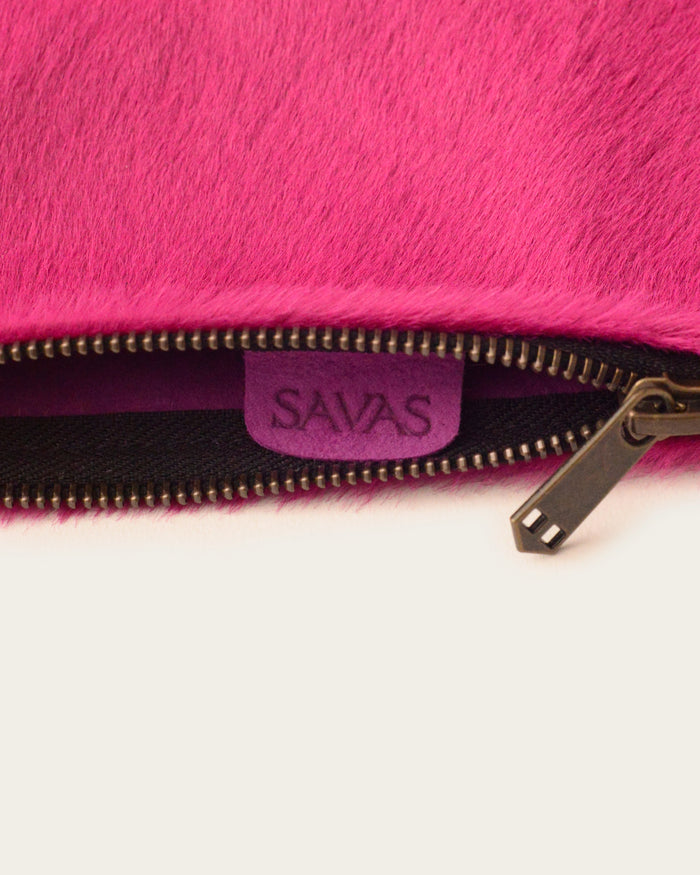 artisan-made clutch in hot pink calf hair for men and women luxury shopping at atelier savas in nashville tennessee