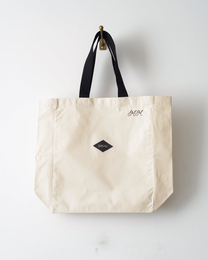 large canvas tote bag with black handle for beach or everyday designed by atelier savas in nashville tennessee for men and women