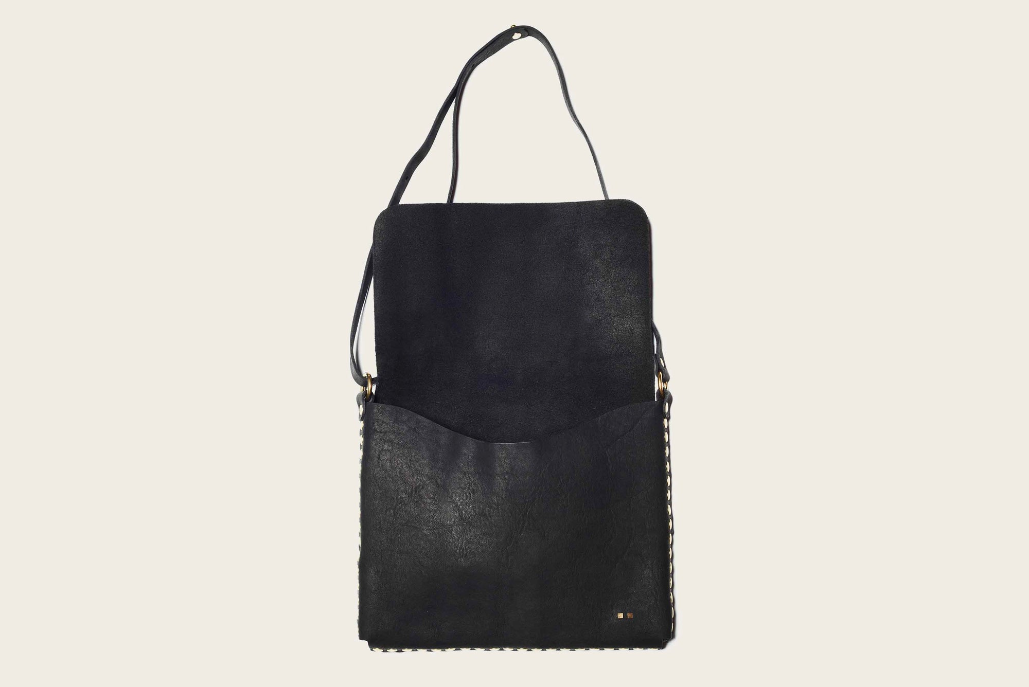 custom leather satchel crossbody bag for men and women with western style by atelier savas in nahville tennessee