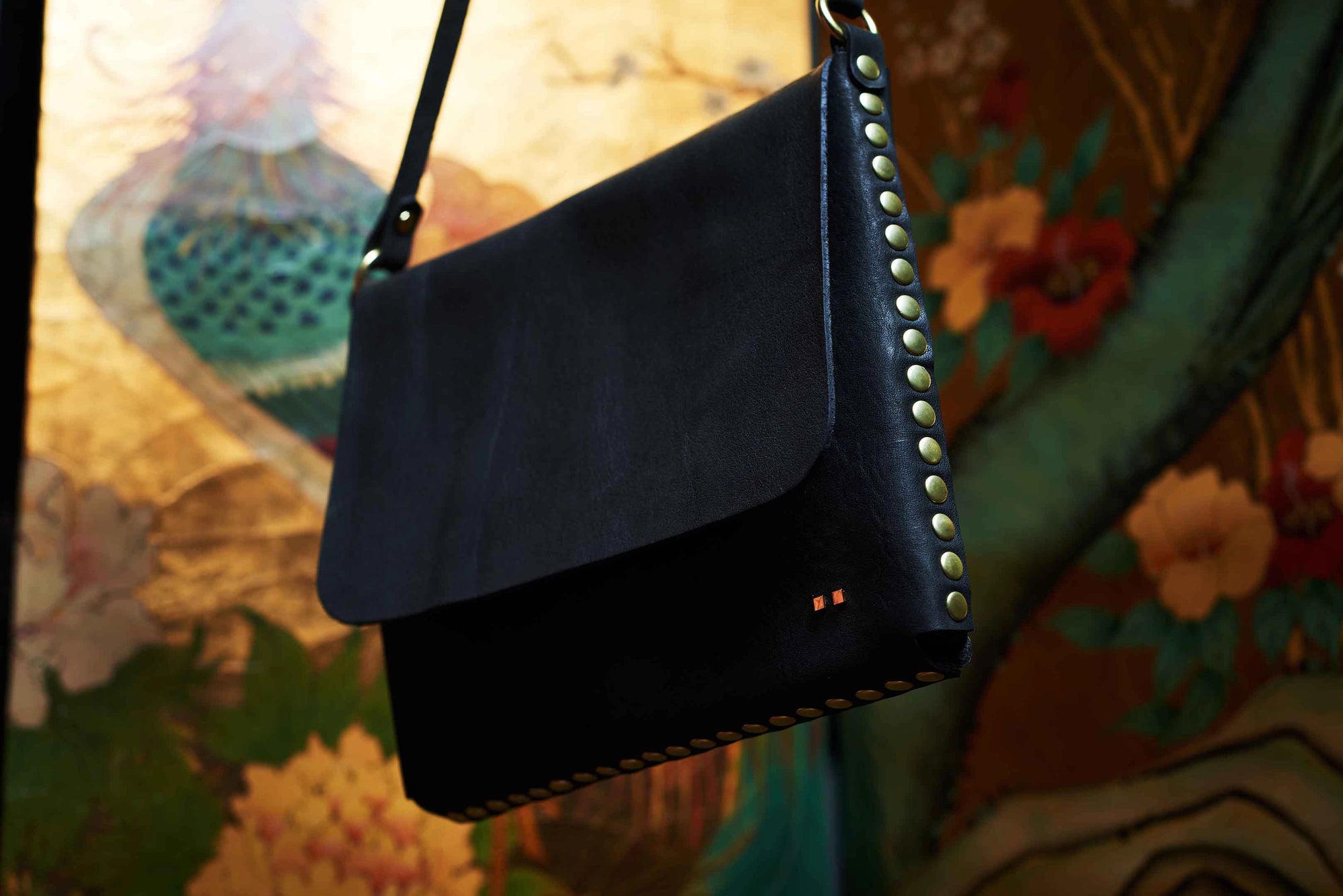 handmade leather crossbody bag for men with western style detail by atelier savas in nashville tennessee