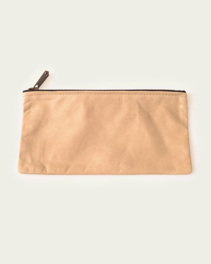 artisan-made leather clutch in tan by luxury brand atelier savas in nashville tennessee