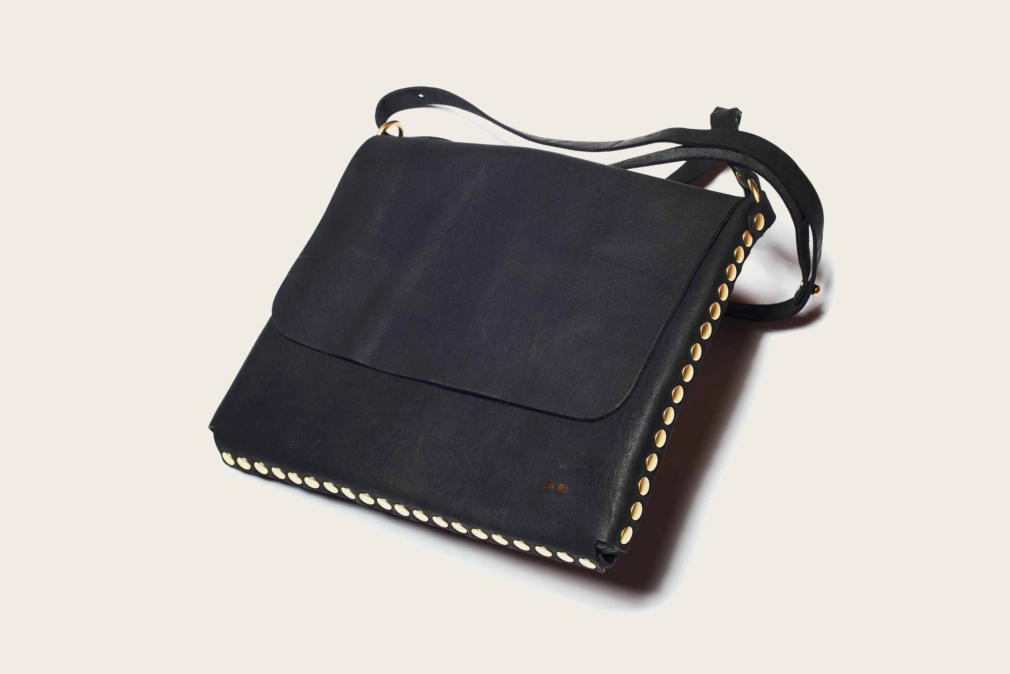 handmade leather crossbody satchel bag in black for men and women with western style by atelier savas in nashville tennessee