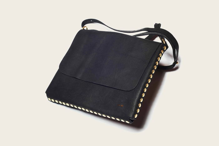 handmade leather crossbody satchel bag in black for men and women with western style by atelier savas in nashville tennessee