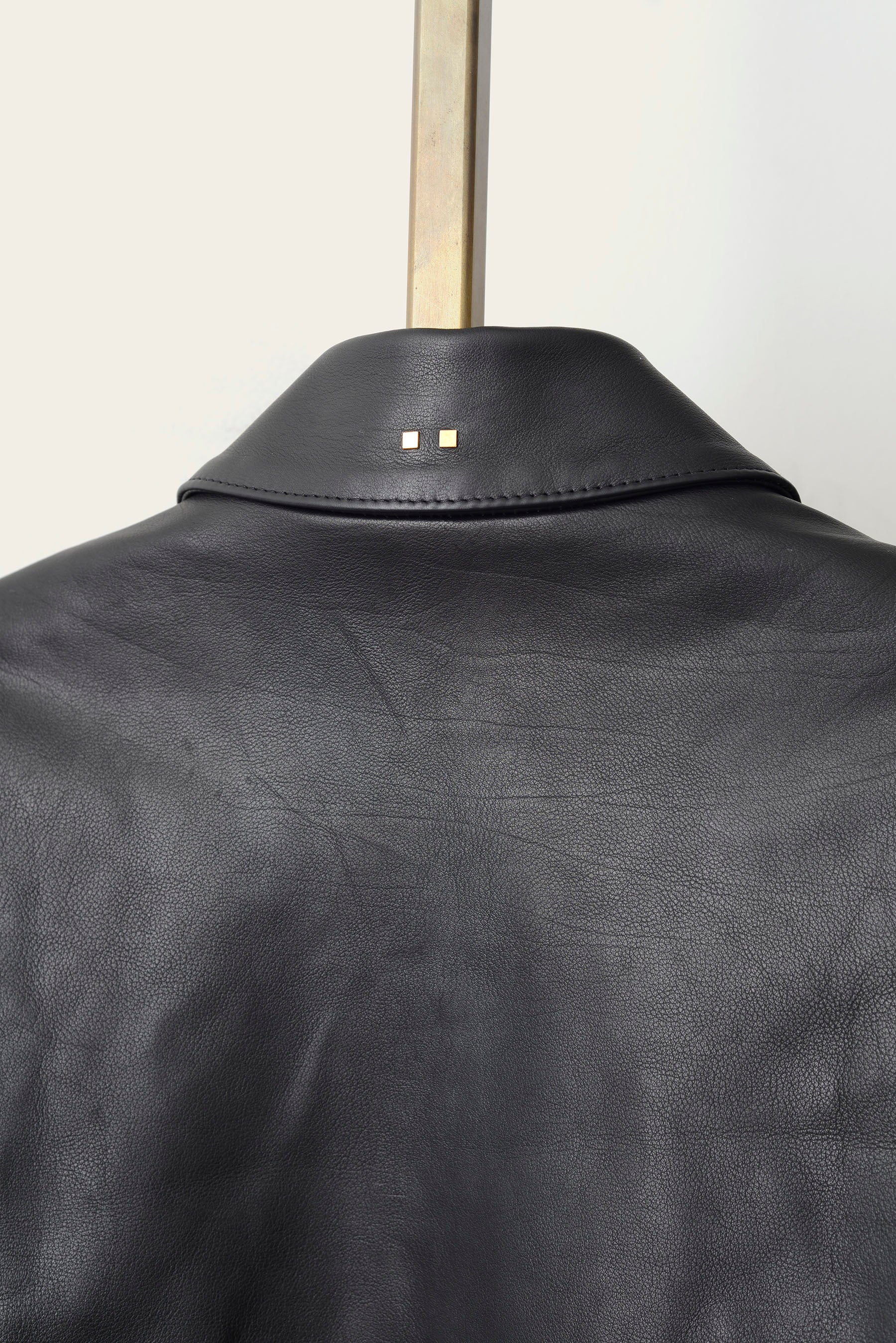 custom black leather jacket with hand-stitched details by atelier savas in nashville tennessee