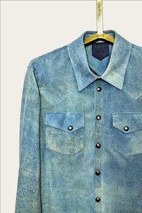 collar and pocket detail of mens luxury shirt jacket in indigo blue genuine leather with handmade snaps by luxury menswear designer savas in nashville tennessee