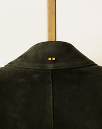 artisan-made details of hunter green bomber jacket with custom hardware by luxury designer savas in nashville tennessee