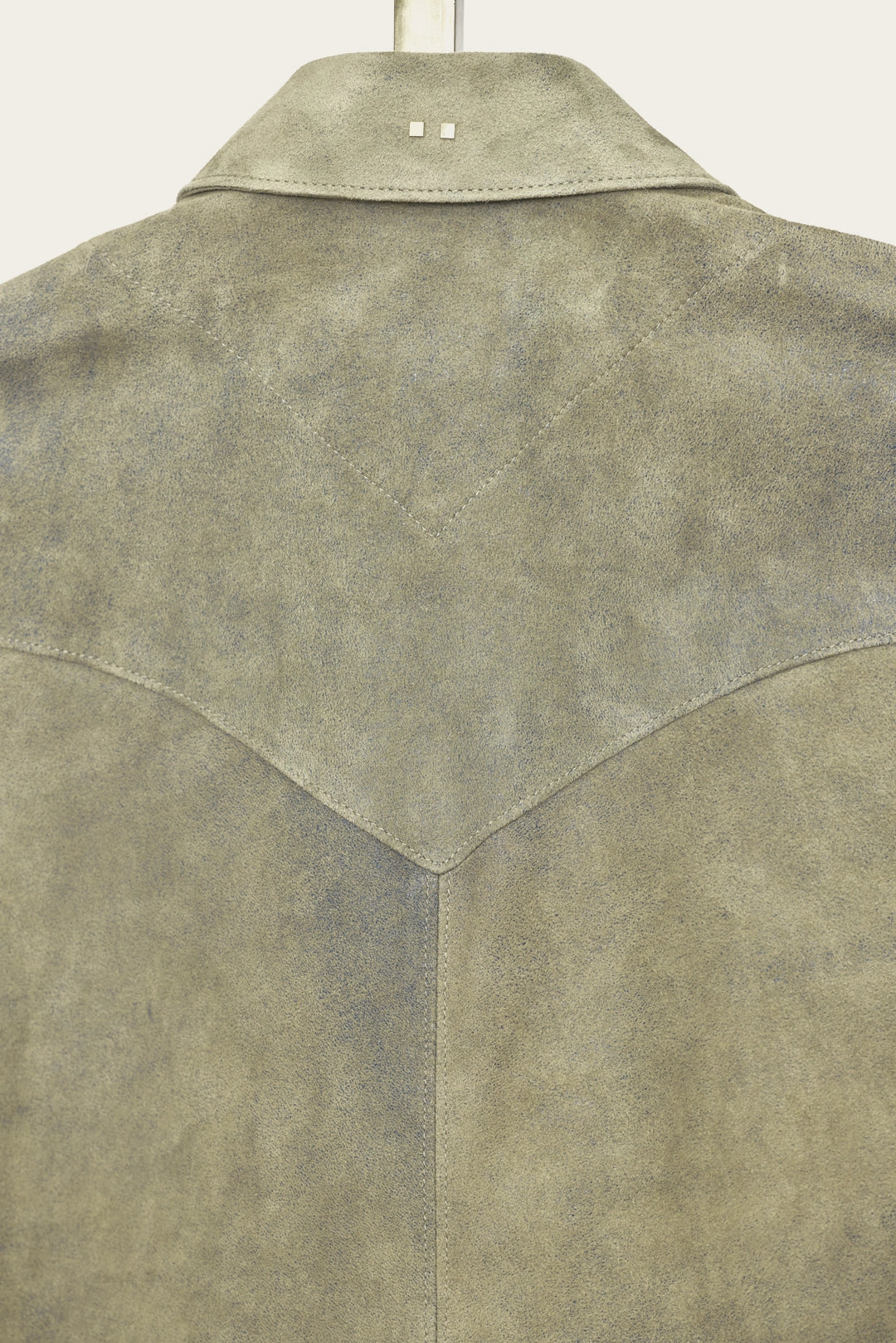 handmade details of mens genuine italian leather shirt jacket with snaps by luxury western wear designer savas in nashville tennessee