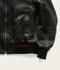artisan-made genuine leather jacket in black with red detail by savas in nashville tennessee