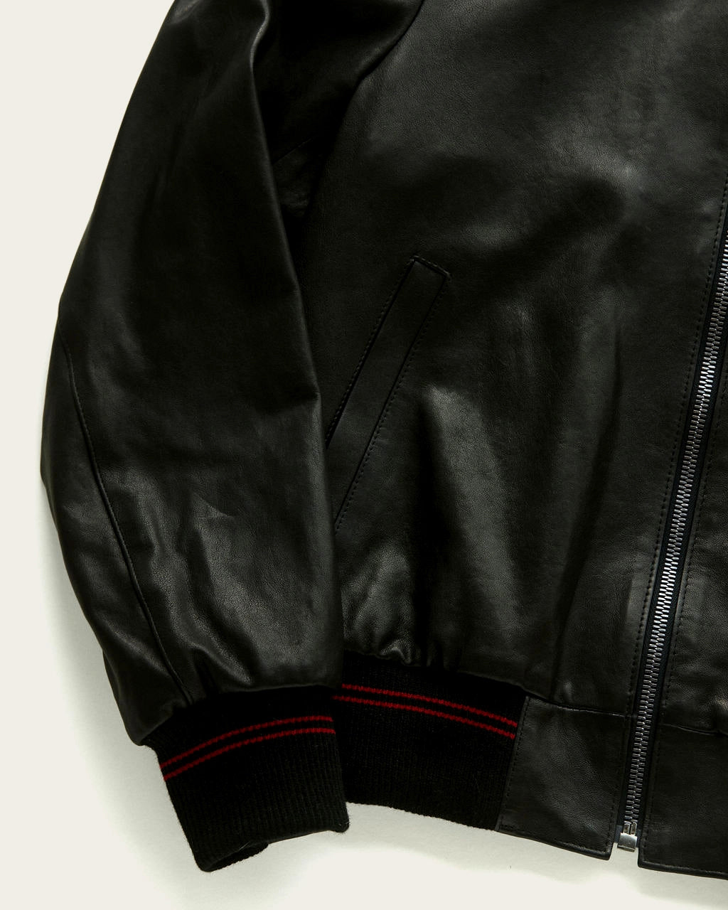 custom leather bomber jacket with brass zipper artisan-made in italy for savas in nashville tennessee