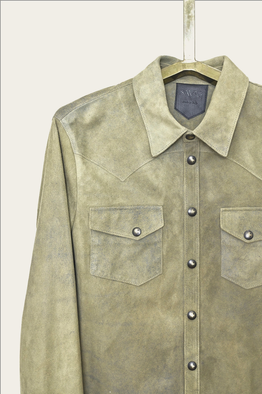 close up of yoke and collar of mens genuine italian leather shirt jacket with metal snaps by luxury western wear designer savas in nashville tennessee