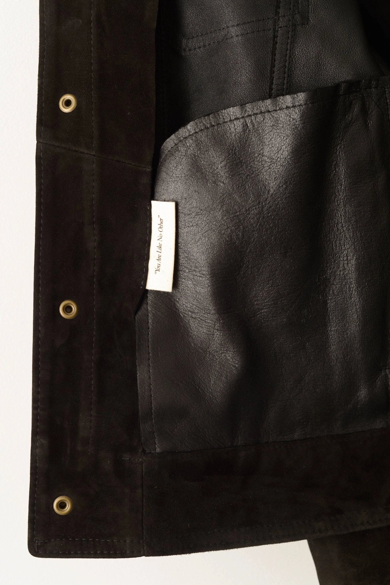 detail shot of unlined suede black shirt jacket artisan-made by savas in nashville tennessee