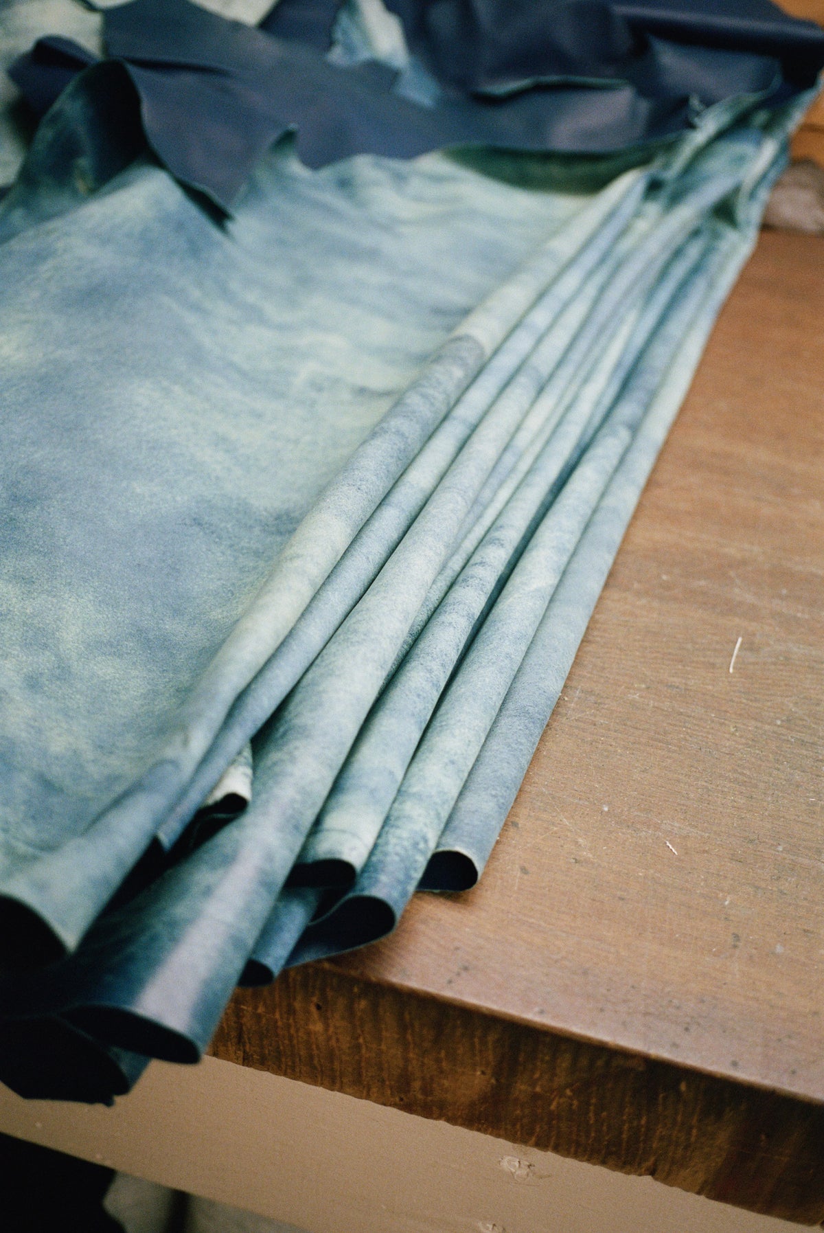 Image of several layers of folded Pacific Diego leather.