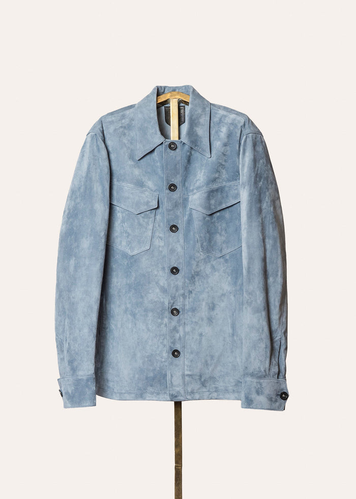 Luxury Italian calf suede overshirt in Aster Blue handmade in Tuscany by Savas — refined men’s suede jacket with trapezoid pockets and horn buttons.
