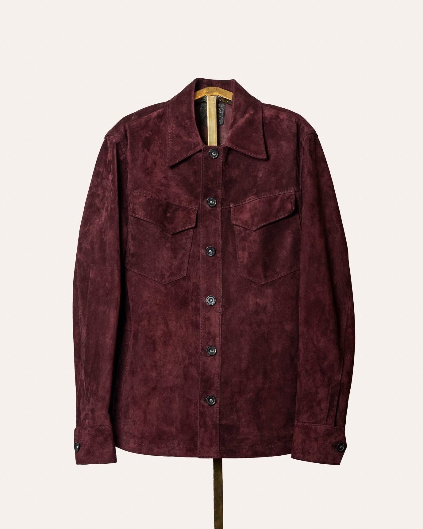Luxury Italian calf suede overshirt in deep burgundy by Savas — handmade in Tuscany with horn buttons and signature pockets.