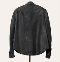 Tailored dark gray suede shirt for men, modeled on a mannequin, luxury menswear piece.