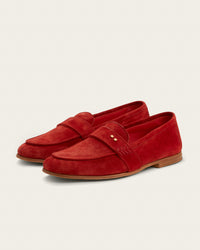 The Coyle loafer in saffron Italian calf suede, three-quarter angle showing napped finish and Bologna construction