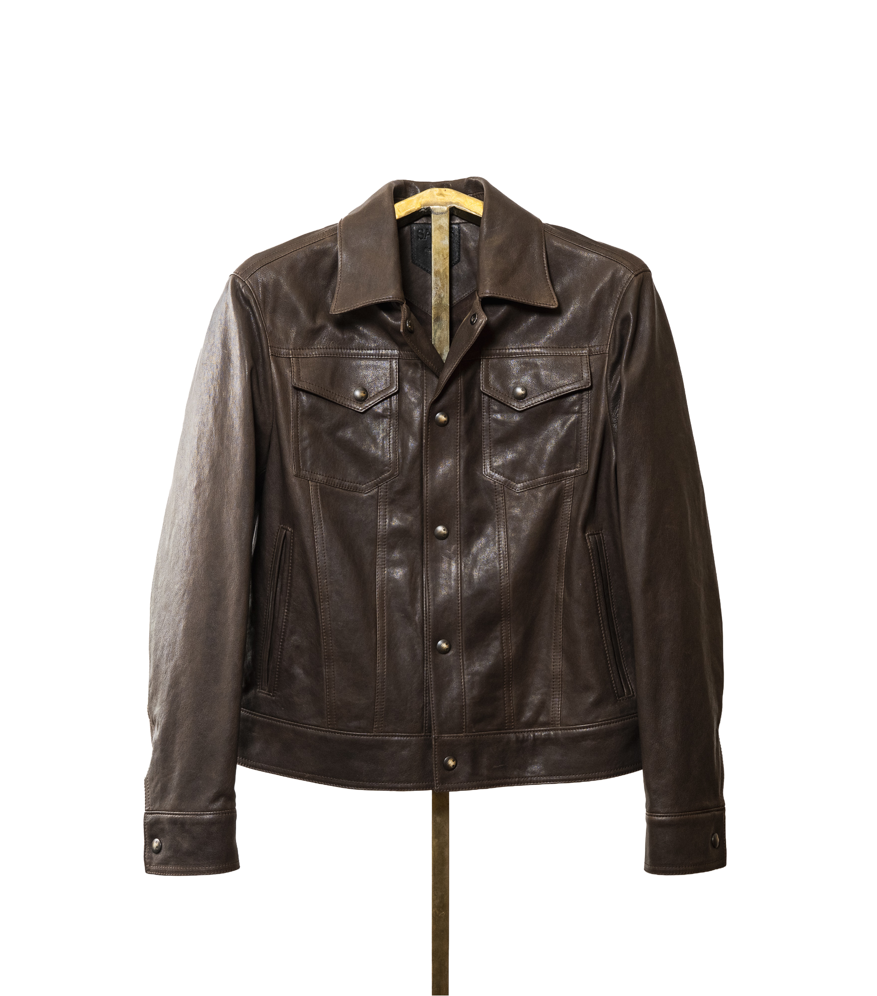 A softly tailored brown lamb leather jacket with a clean, versatile silhouette, gunmetal hardware, and smooth lining. Designed for everyday wear, adaptable from casual to refined styling.