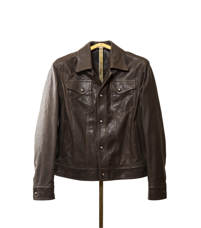 A softly tailored brown lamb leather jacket with a clean, versatile silhouette, gunmetal hardware, and smooth lining. Designed for everyday wear, adaptable from casual to refined styling.