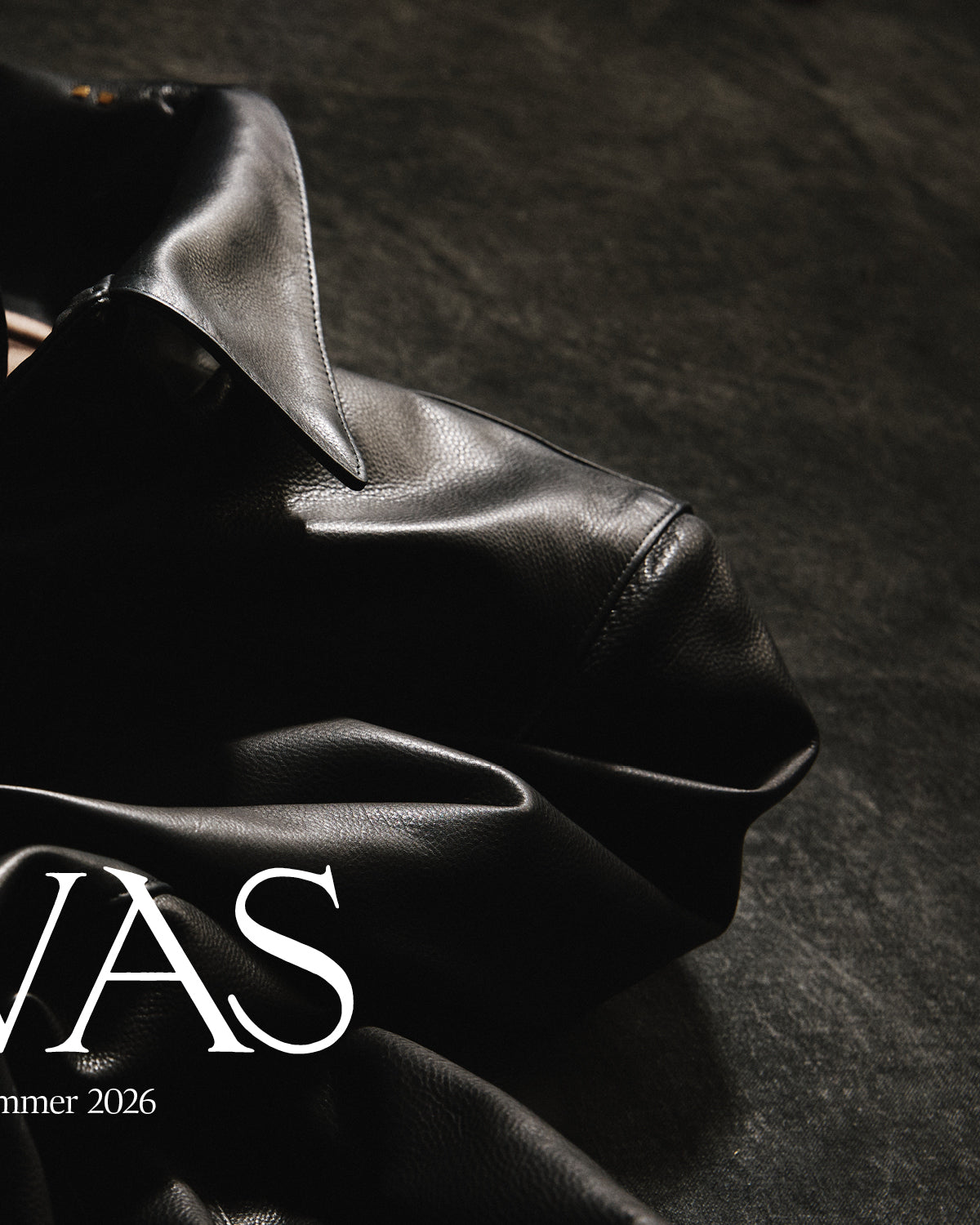 Black Leather Savas Jacket on textured background with the words "Savas Spring Summer 2026"