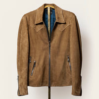 Suede jacket featuring three exterior zip pockets, adjustable sleeve gussets, and a clean, minimalist cut.