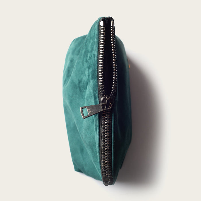 Teal pouch with a zipper on a white background