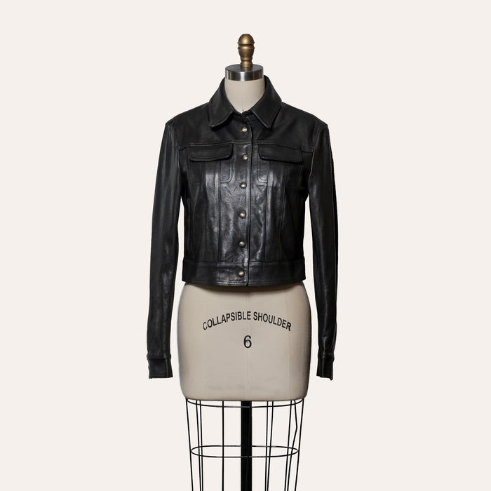 Black leather jacket on a mannequin with 'Collapsible Shoulder' label against a white background