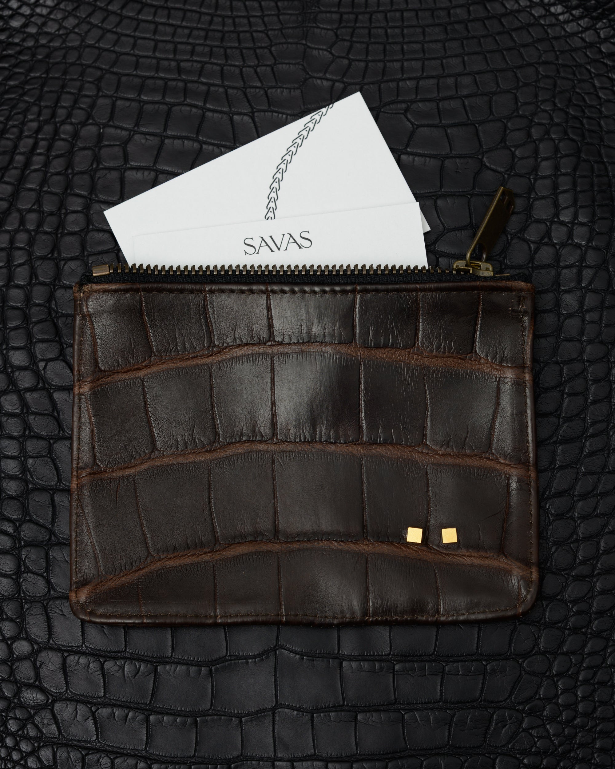 handmade zipper pouch in brown alligator by atelier savas in nashville tennessee