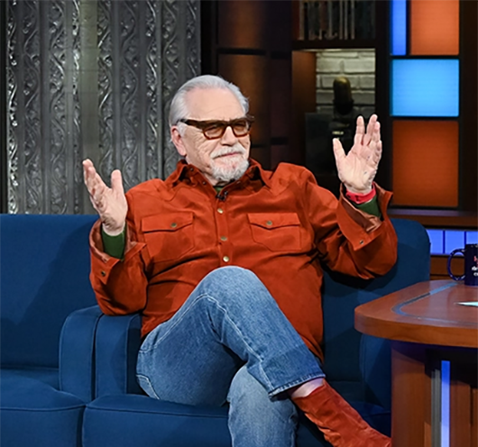 Image of Brian Cox appearing on the Colbert show wearing a Savas jacket.