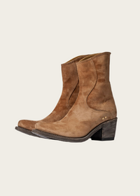Cognac suede Fleetwood Boot shown from the side, highlighting the slim shaft and 2.5-inch Cuban heel