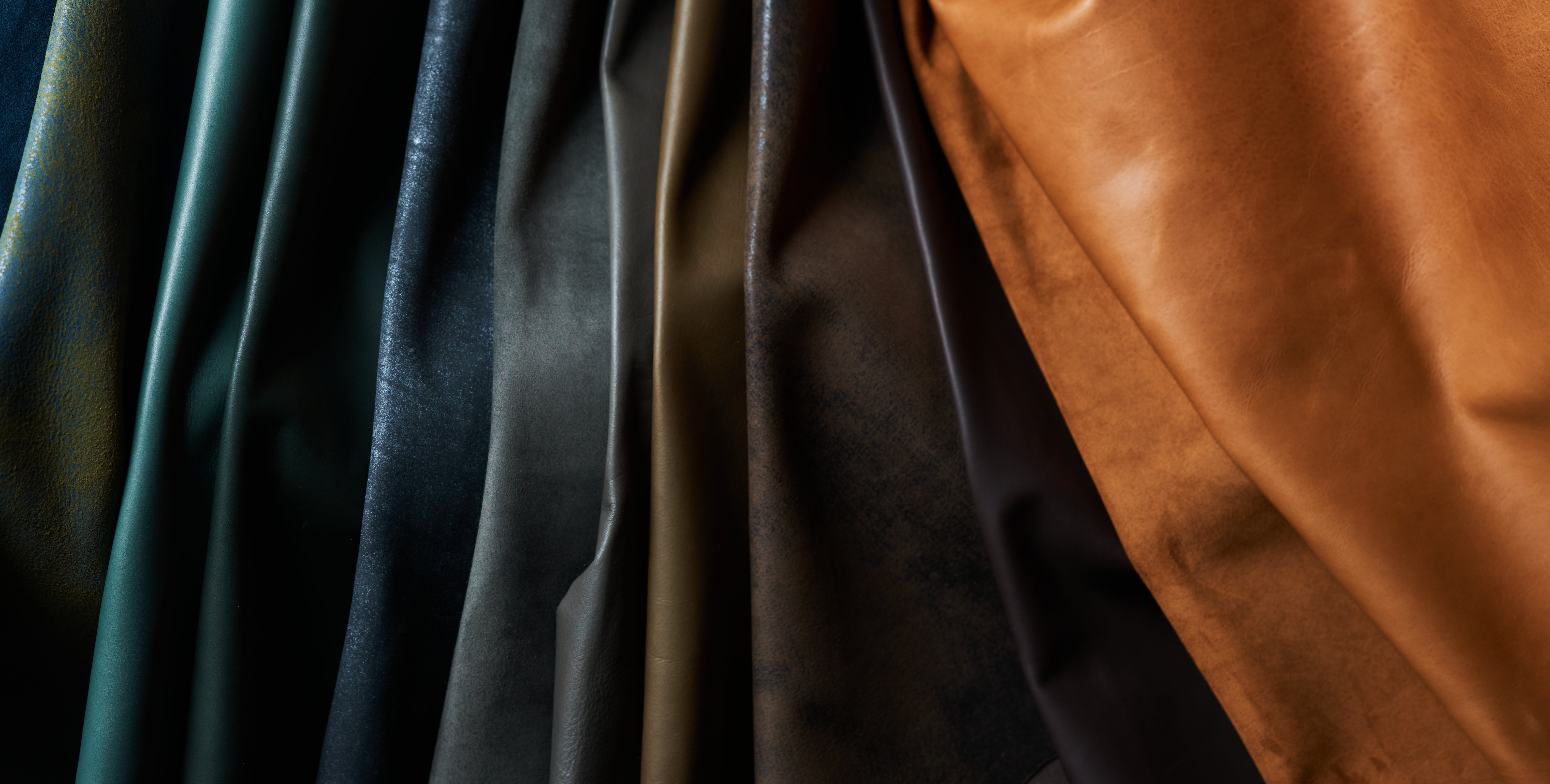 Image of Vari-colored leathers folded on top of each other.