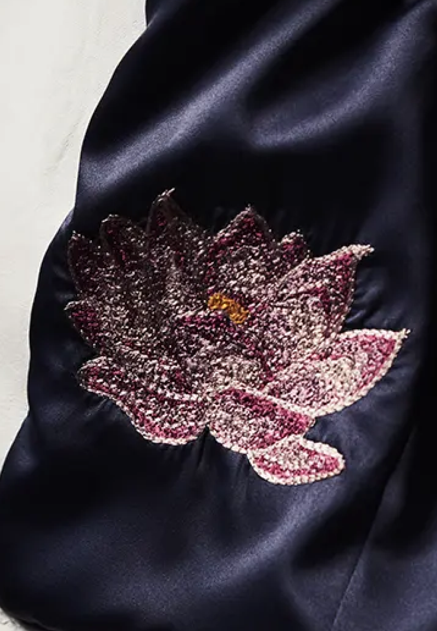 Example of multicolored lotus embroidery on a Savas jacket lining.