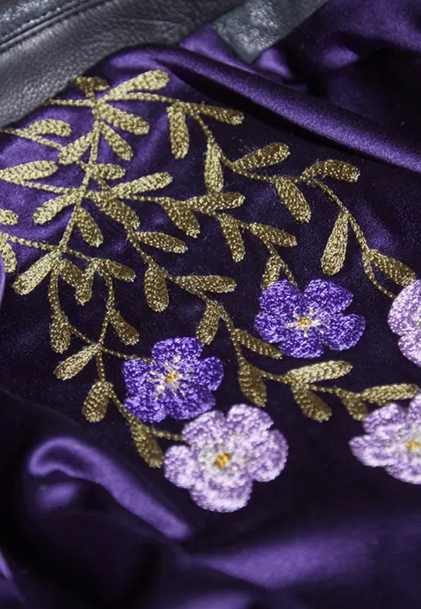 Example of multicolored flowers embroidery on a Savas jacket lining.