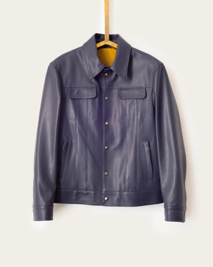 artisan-made genuine leather trucker jacket in dark navy with custom lining by luxury designer savas in nashville tennessee