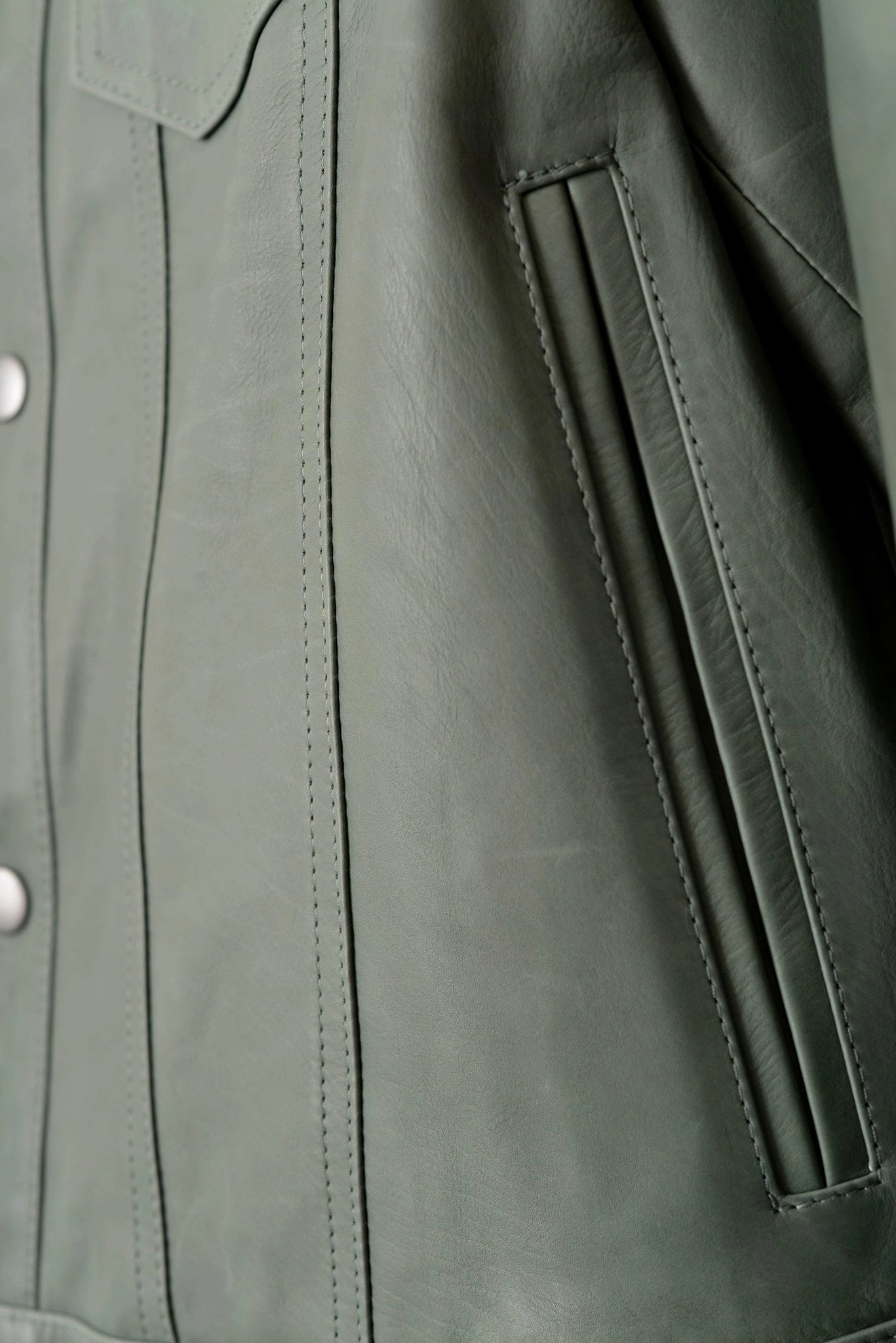 artisan-made leather jacket with pockets in green by luxury menswear designer savas in nashville tennessee