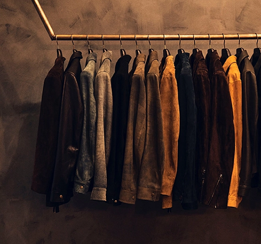 Image of a rack full of Savas jackets.