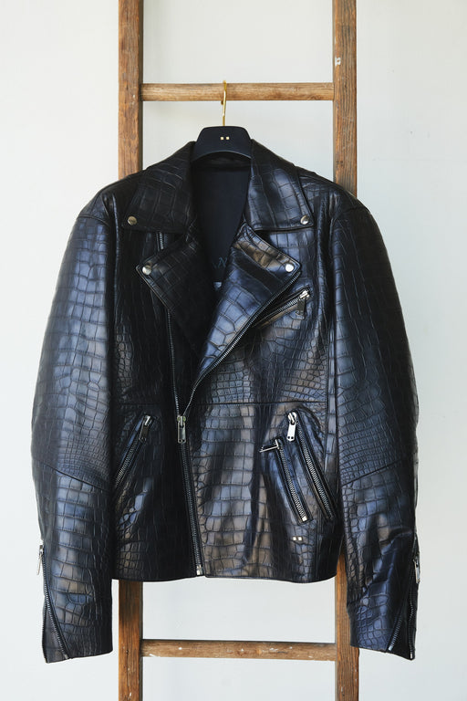 Image of an Alligator leather black jacket.